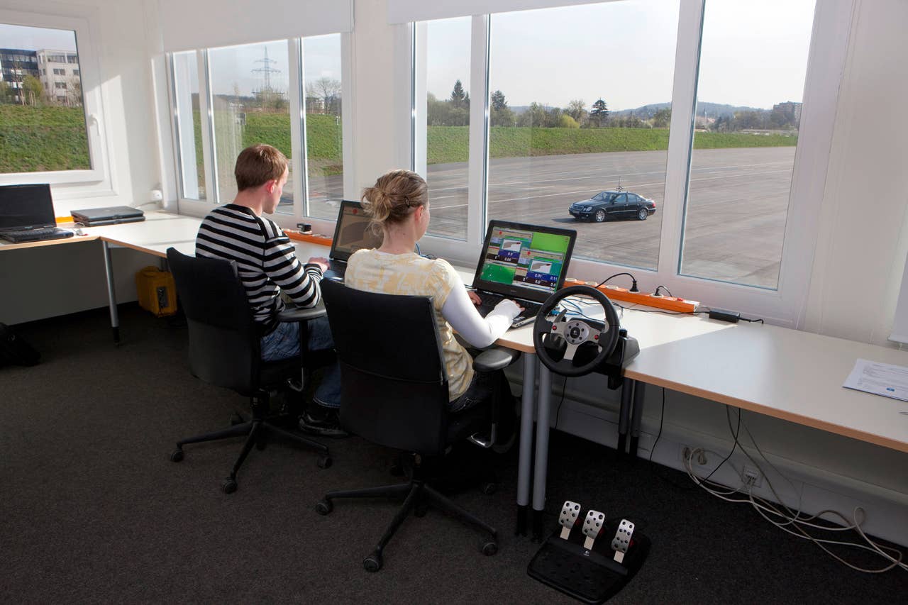 "Automated Driving" - Test engineers at control station.