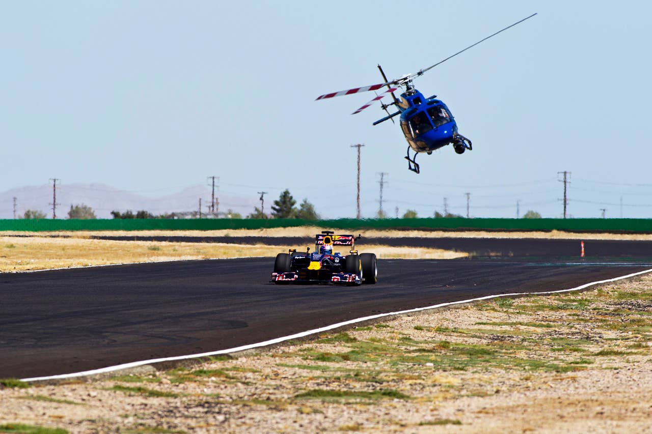 Tom Cruise drives the Red Bull F1 Race Car.
