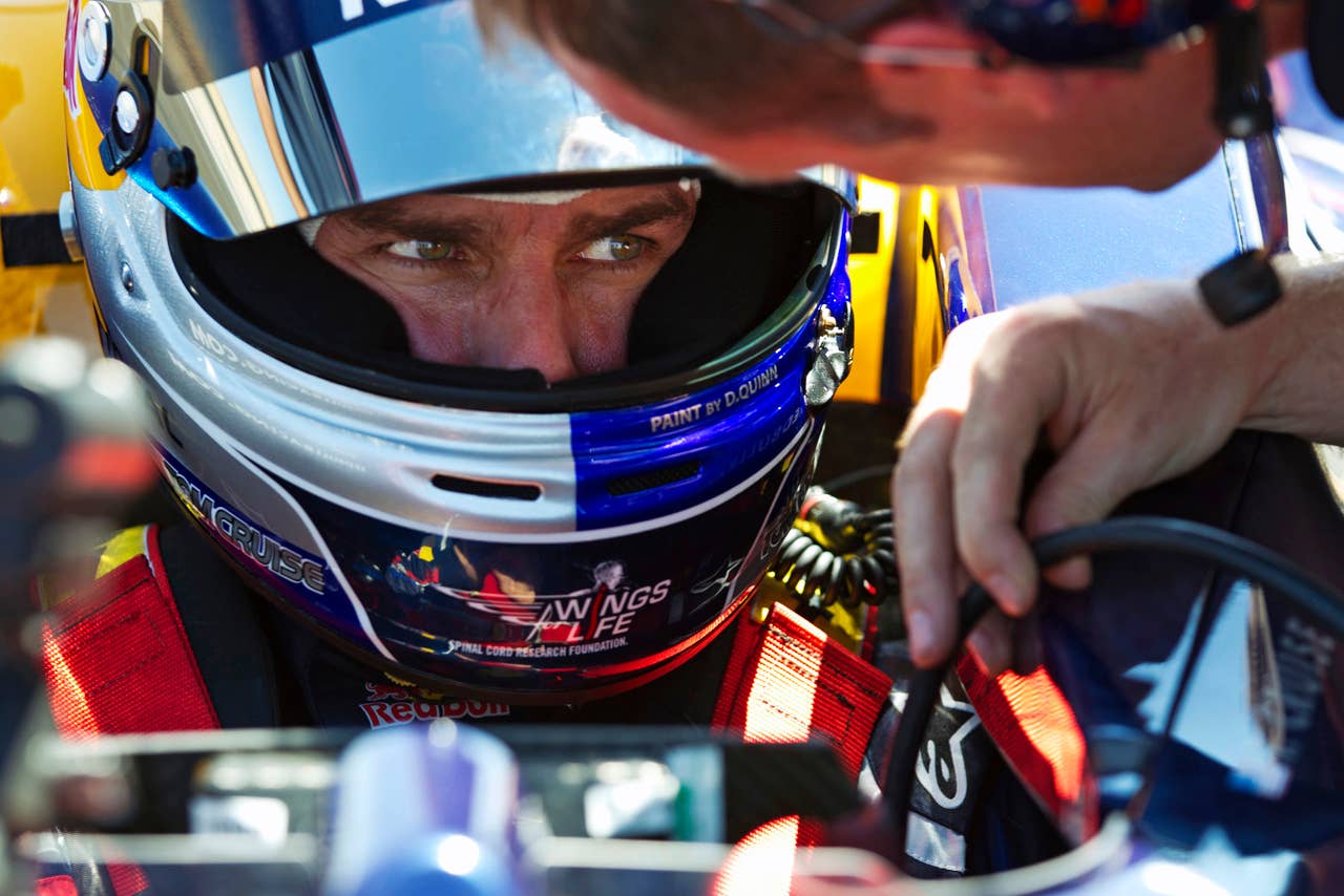 Tom Cruise drives the Red Bull F1 Race Car.