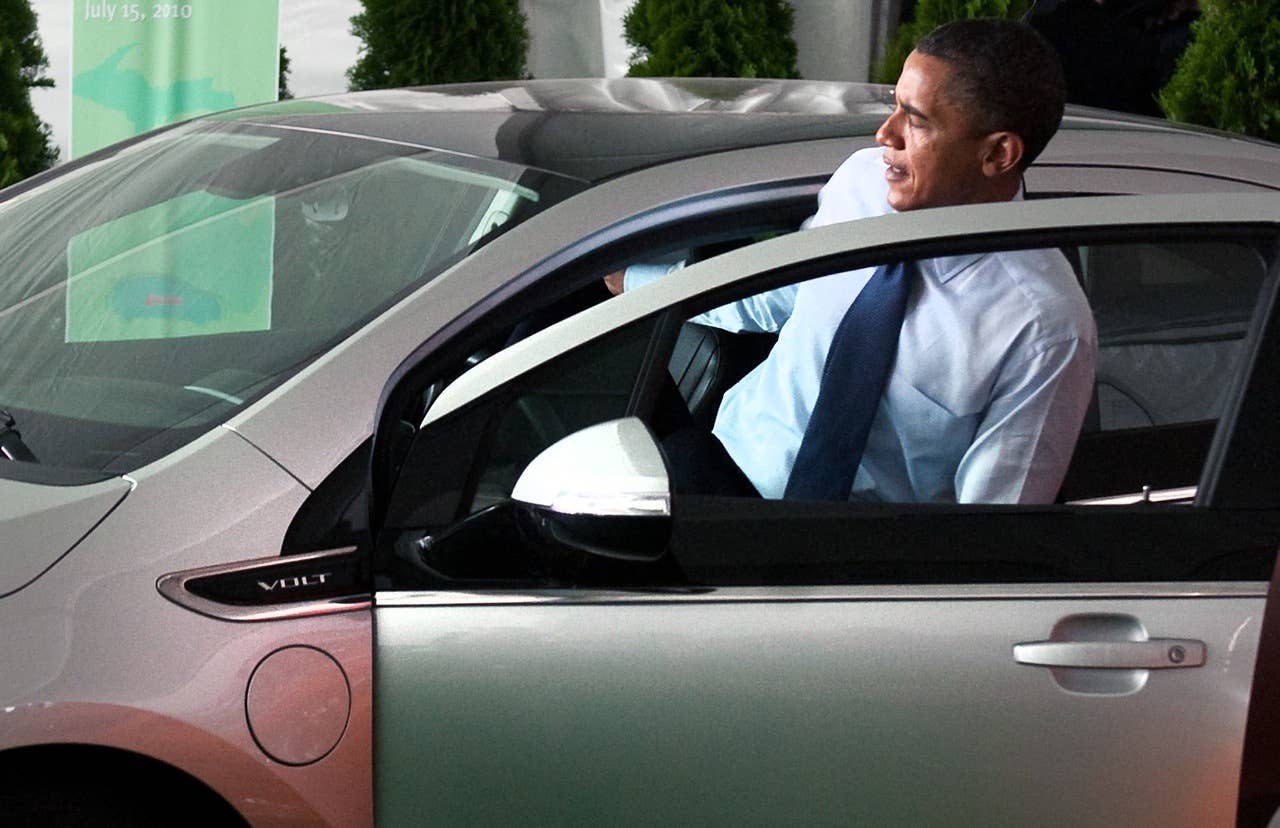 US President Barack Obama gets out of an electric Chevy Volt following a groundbreaking ceremony for Compact Power's new advanced battery factory in Holland, Michigan, July 15, 2010. The plant will build batteries for electric vehicles including the Chevrolet Volt and Ford Focus. AFP PHOTO / Saul LOEB (Photo credit should read SAUL LOEB/AFP/Getty Images) *** THIRD PARTY Editorial Rights Have Been Purchased by Chevrolet for Editorial Use by print and online media.
