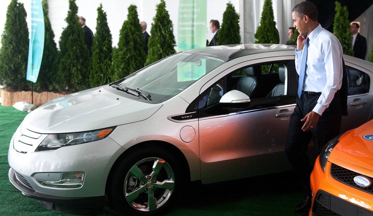 US President Barack Obama looks at an electric Chevy Volt following a groundbreaking ceremony for Compact Power's new advanced battery factory in Holland, Michigan, July 15, 2010. The plant will build batteries for electric vehicles including the Chevrolet Volt and Ford Focus. AFP PHOTO / Saul LOEB (Photo credit should read SAUL LOEB/AFP/Getty Images) **** THIRD PARTY Editorial Rights Have Been Purchased by Chevrolet for Editorial Use by print and online media.