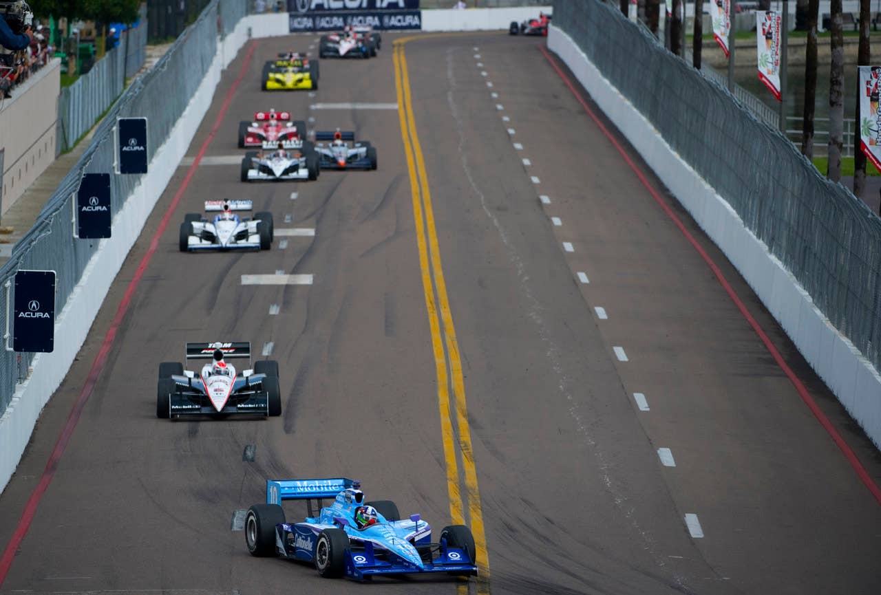 ST. PETERSBURG, FL - MARCH 29:  Dario Franchitti of Scotland driver of the #10 Cottonelle Target Chip Ganasi Racing Dallara Honda leads a pack of cars during the IndyCar Series Honda Grand Prix of St.Petersburg on March 29, 2010 on the streets of St. Petersburg, Florida. (Photo by Robert Laberge/Getty Images) *** Local Caption *** Dario Franchitti
