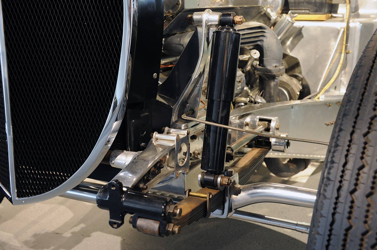 Leaf springs, dampers and locating arms
