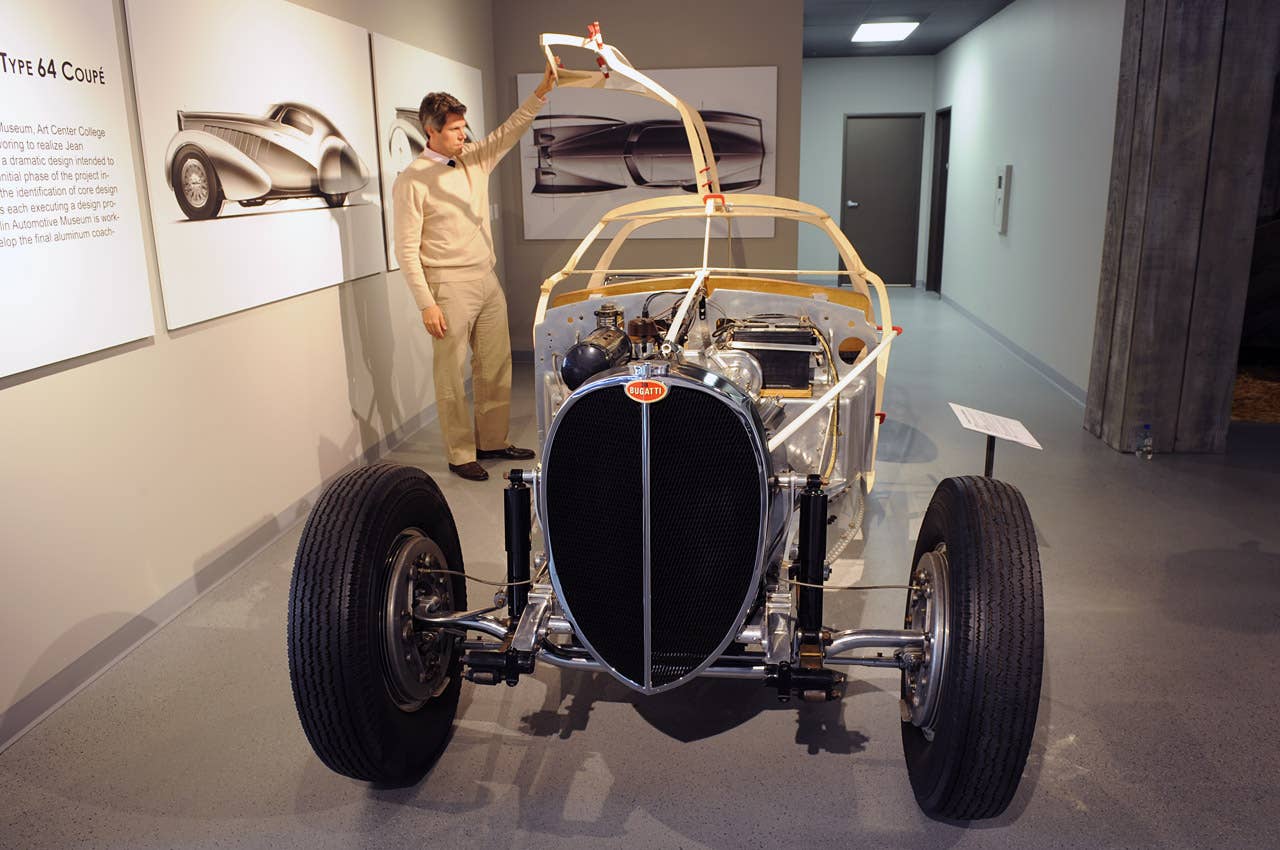 Mullin Automotive Curator Andrew Reilly showing off the proposed gullwings