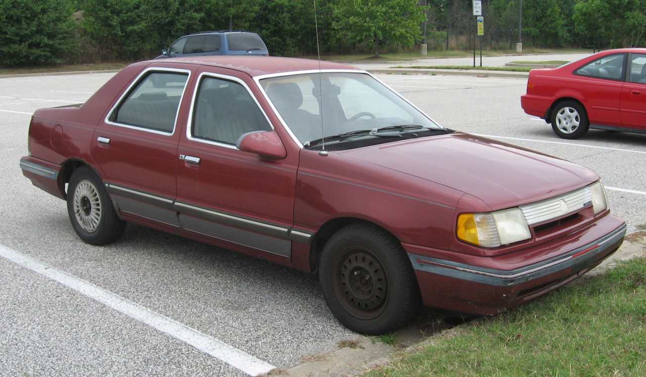Here we have the Mercury Topaz. Does the idea of a slightly upmarket version of the unloved Ford Tempo strike you as an odd idea? Yeah, us too. Still, Ford did indeed offer the Topaz in Lincoln Mercury dealerships from 1984 until 1994, after which it was replaced by the Mercury Mystique (aka Ford Contour)... which was much better but still uncalled for as a Mercury.