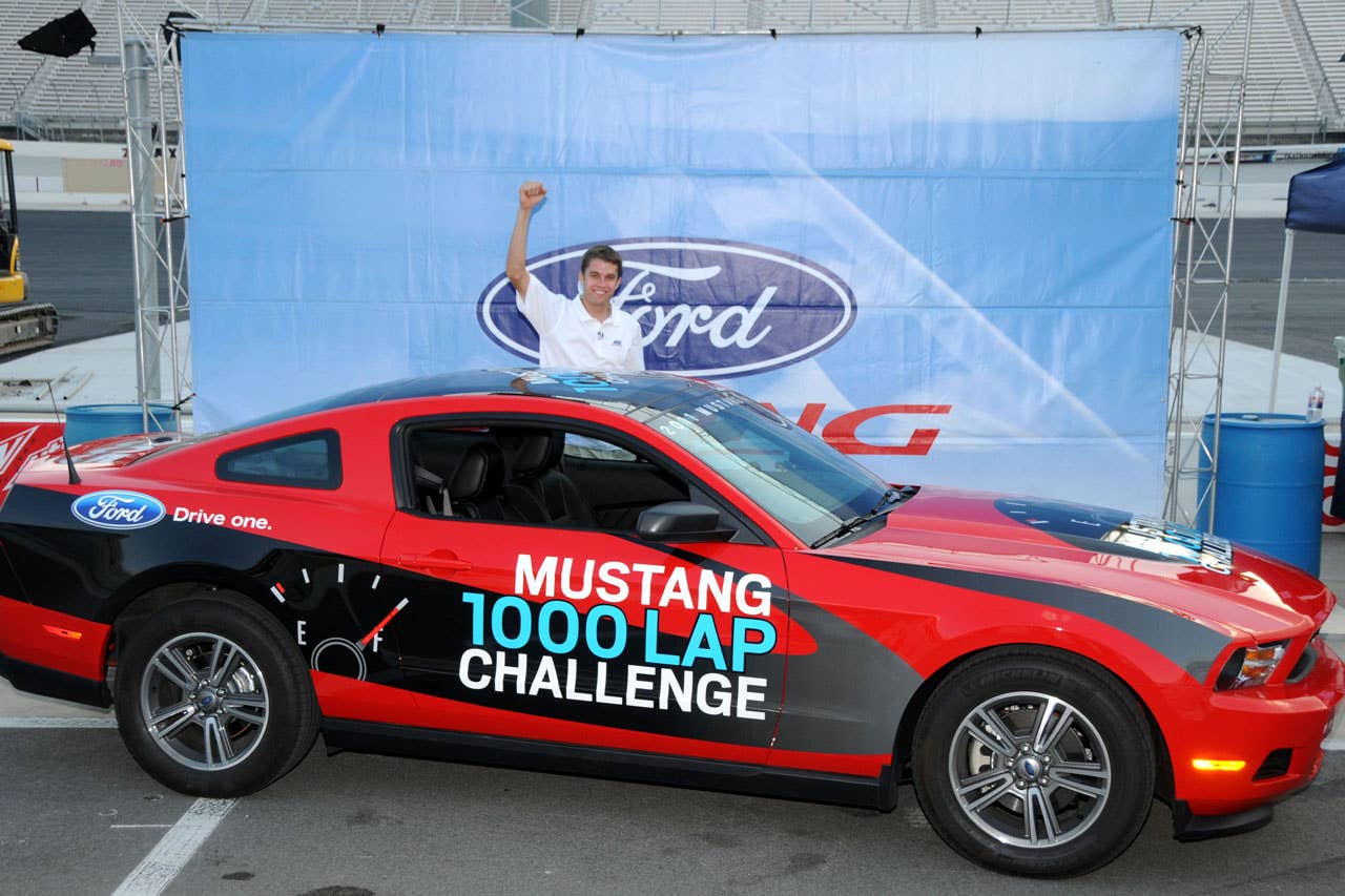 06/23/10 Bristol, Tn. -  Ford NASCAR driver David Ragan celebrates after passing the one thousand lap mark in the Mustang 1000 Lap Challenge in which a team of Ford engineers attempt to drive a 2011 Mustang V6 1000 laps or 533 miles around Bristol Motor Speedway on a single tank of fuel.  2010, Paul Webb