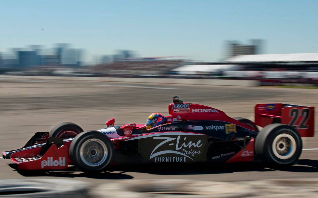 England's Justin Wilson exits the pits during the third practice at the Honda Indy Edmonton, in Edmonton, Alberta, on Saturday, July 24, 2010.  (AP Photo/The Canadian Press,John Ulan)
