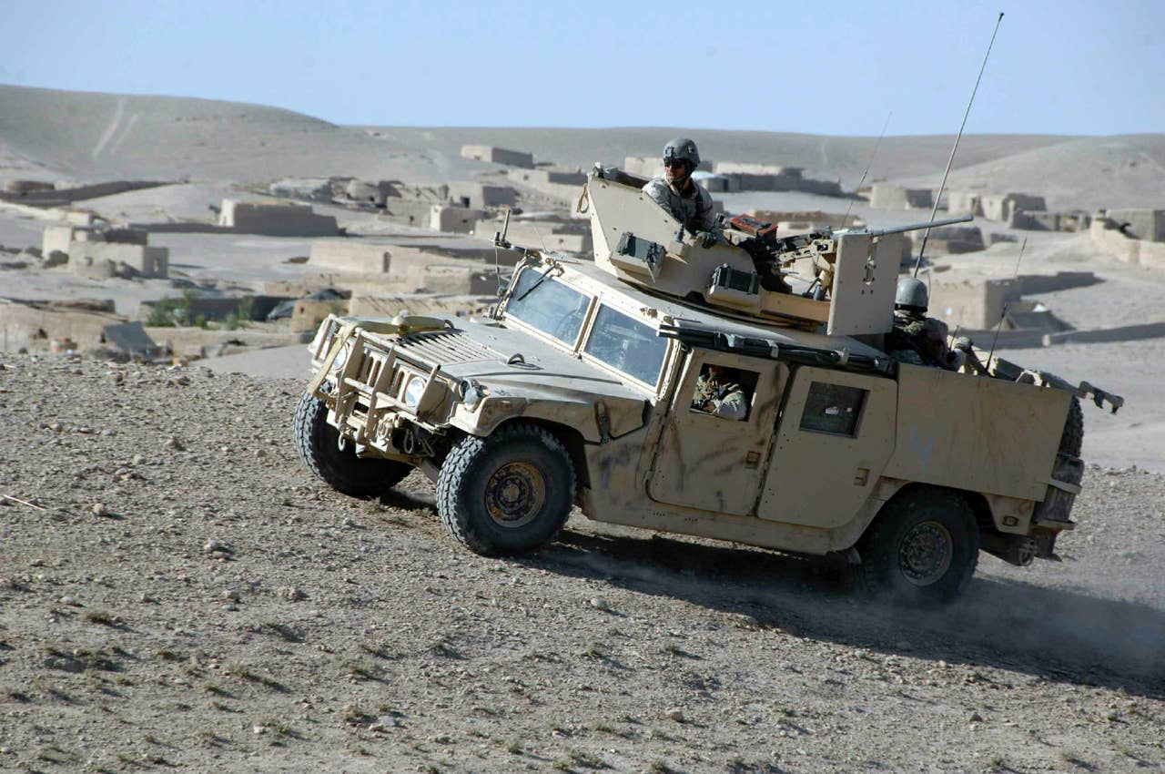 Coalition Forces patrol through the Helmand Province on October 15, 2007, Afghanistan.  (U.S. Army Photo by Specialist David Gunn) (Released)