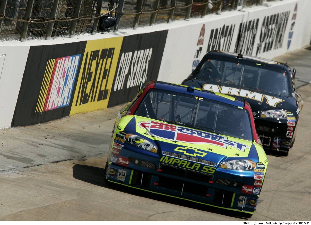 Kyle Busch, driver of the #5 Carquest Chevrolet, leads Regan Smith, driver of the #01 U.S. Army Chevrolet, during the NASCAR Nextel Cup Series Food City 500 at Bristol Motor Speedway on March 25, 2007 in Bristol, Tennessee.