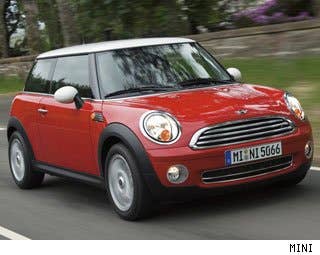 MSRP: $19,500 - $24,950 Invoice: $17,632 - $22,537 Fuel Economy: 29 mpg City, 37 mpg Highway European car companies know that hatchbacks can and should be fun. Enter the MINI Cooper, just about the most fun we think anyone can have driving a hatchback priced under $30,000. We prefer the turbo-charged version of the 1.4 liter four cylinder engine and the manual transmission, but the automatic works nicely too. There is so much fun in the styling. It looks awesome in your driveway, and as you drive it. The fuel economy is excellent at 29/37. Owning a MINI is a statement, and if you buy into the MINI gear to go with your car, it's really a lifestyle and fashion choice. MINI does not top the prevailing lists for reliability, but we think that is splitting hairs. The cars have proven to be very reliable and the dealer experience is excellent. We love the fact that MINI offers a bike, as well as loaner cars, if you leave your car for service. Research the MINI Cooper MINI Cooper Photos & Information MINI Cooper Specs MINI Cooper Local Dealer Price Quote