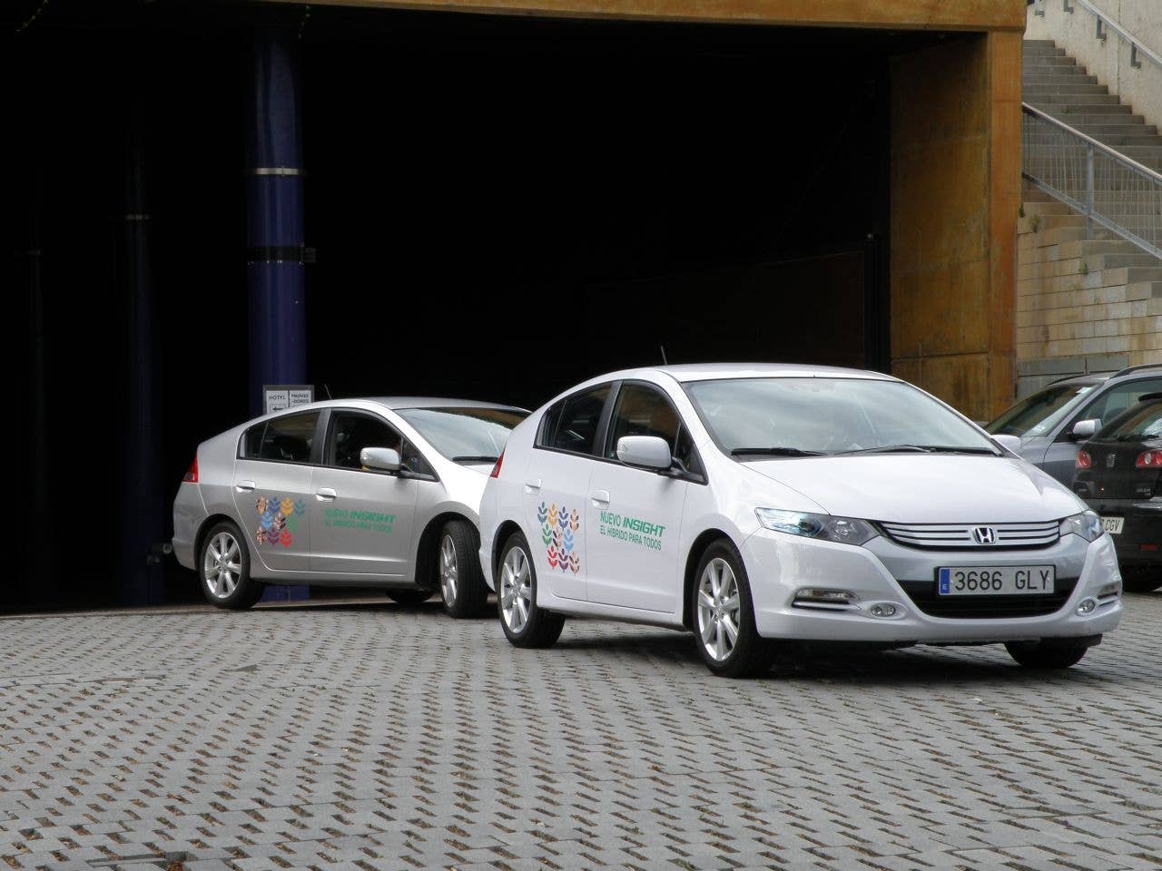Cars leaving the Hotel court to perform the urban circuit that tested their hypermiling skills