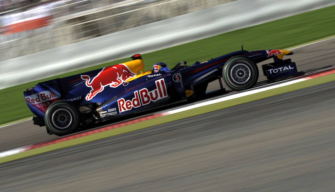 Red Bull's German driver Sebastian Vettel drives at the Bahrain international circuit on March 14, 2010 in Manama. The season-opening Bahrain Grand Prix, the first round of the 60th anniversary year of the Formula One World Championship, got off to a smooth start at the Sakhir circuit.  AFP PHOTO DDP/   SASCHA SCHUERMANN  GERMANY OUT (Photo credit should read SASCHA SCHUERMANN/AFP/Getty Images)