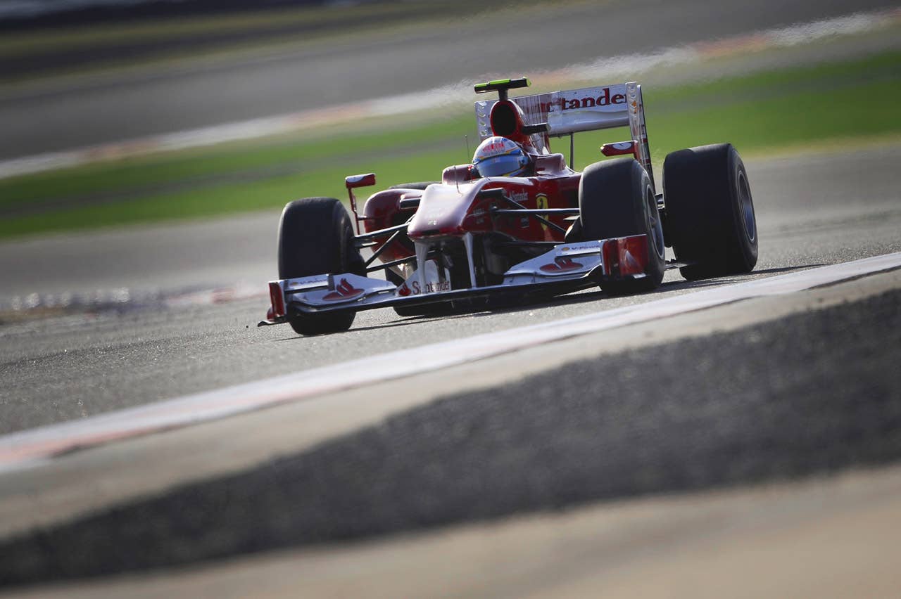 Ferrari's Spanish driver Fernando Alonso drives at the Bahrain international circuit on March 14, 2010 in Manama, during the Bahrain Formula One Grand Prix.          AFP PHOTO / FRED DUFOUR (Photo credit should read FRED DUFOUR/AFP/Getty Images)