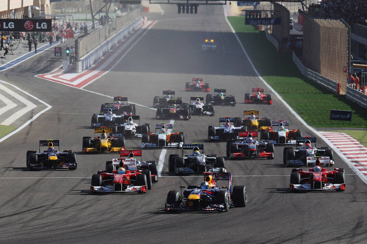 SAKIR, BAHRAIN - MARCH 14:  Sebastian Vettel of Germany and Red Bull Racing leads the field at the start of the Bahrain Formula One Grand Prix at the Bahrain International Circuit on March 14, 2010 in Sakir, Bahrain.  (Photo by Mark Thompson/Getty Images) *** Local Caption *** Sebastian Vettel