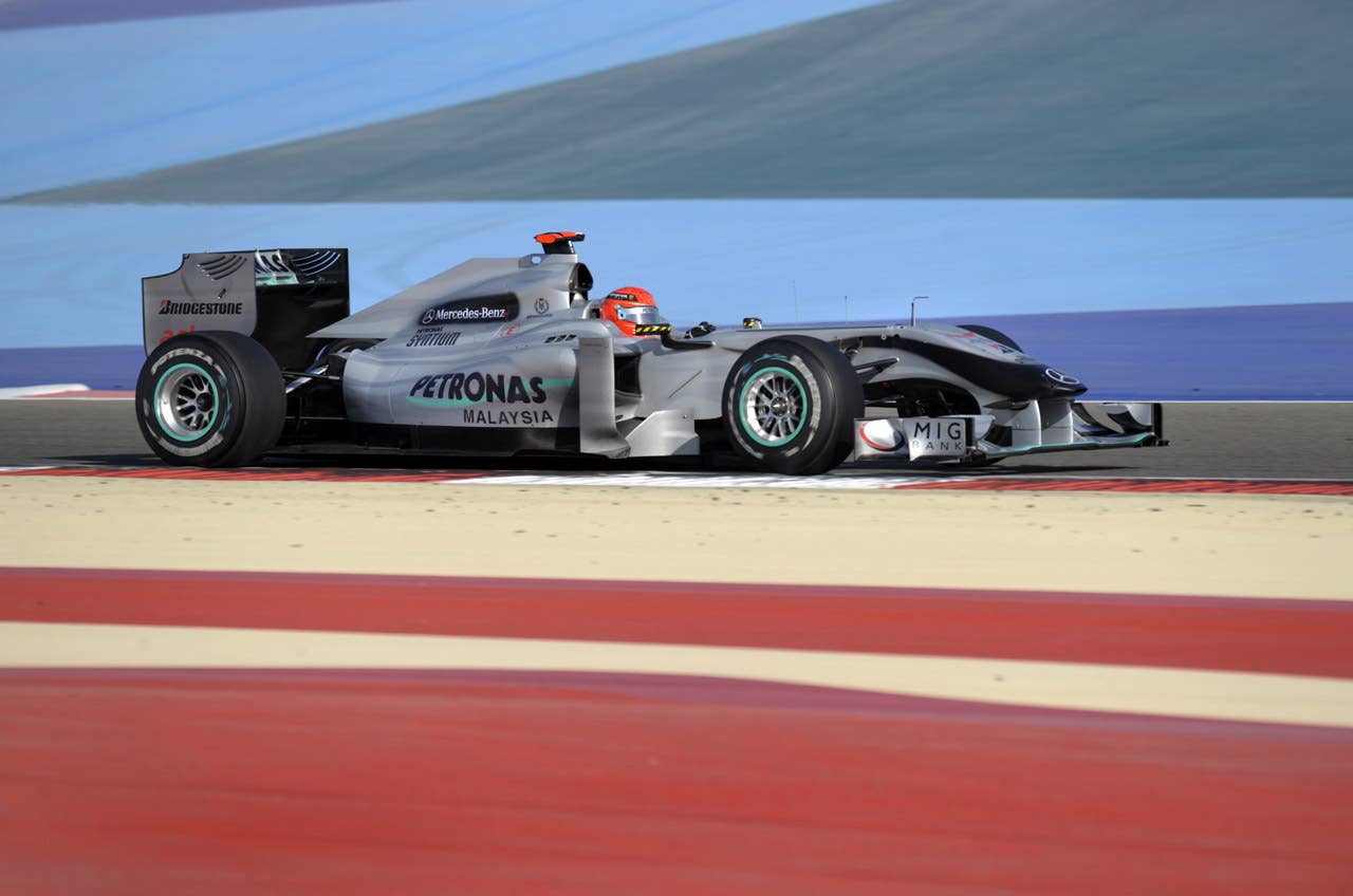 Mercedes GP's German driver Michael Schumacher drives at the Bahrain international circuit on March 14, 2010 in Manama. Ferrari's Spanish driver Fernando Alonso won the race ahead of his Brazilian team mate Felipe Massa and McLaren Mercedes' British driver Lewis Hamilton. AFP PHOTO DDP/  SASCHA SCHUERMANN   GERMANY OUT (Photo credit should read SASCHA SCHUERMANN/AFP/Getty Images)