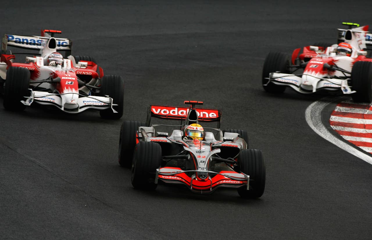 SAO PAULO, BRAZIL - NOVEMBER 02: Lewis Hamilton of Great Britain and McLaren Mercedes drives on his way to winning the Formula One World Championship during the Brazilian Formula One Grand Prix at the Interlagos Circuit on November 2, 2008 in Sao Paulo, Brazil. (Photo by Paul Gilham/Getty Images)