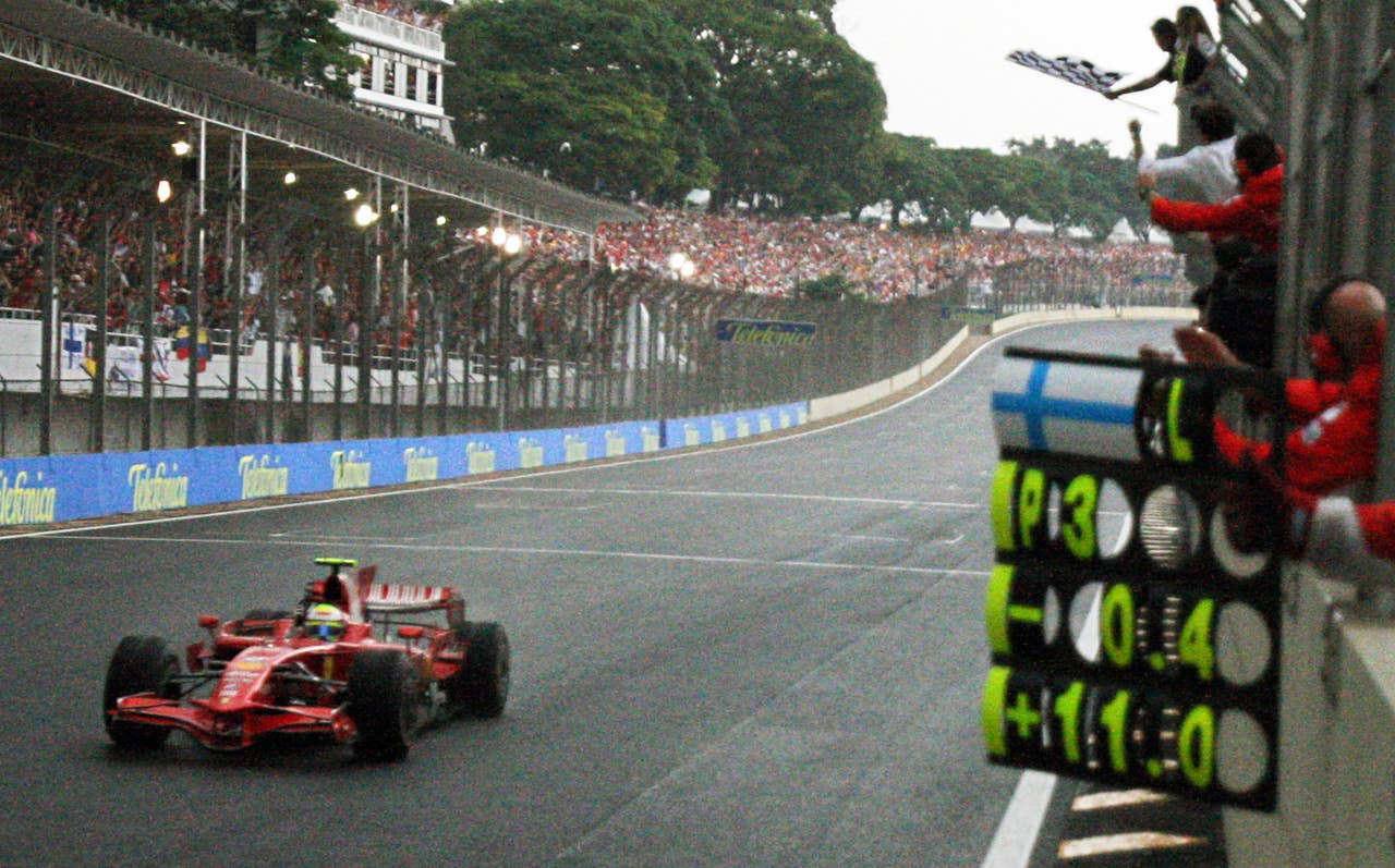 Brazilian Formula One driver Felipe Massa wins Brazil Grand Prix at the Interlagos circuit in Sao Paulo, Brazil, on November 2, 2008. Lewis Hamilton was crowned Formula One champion after finishing fifth in the Brazil Grand Prix AFP PHOTO/VANDERLEI ALMEIDA (Photo credit should read VANDERLEI ALMEIDA/AFP/Getty Images)