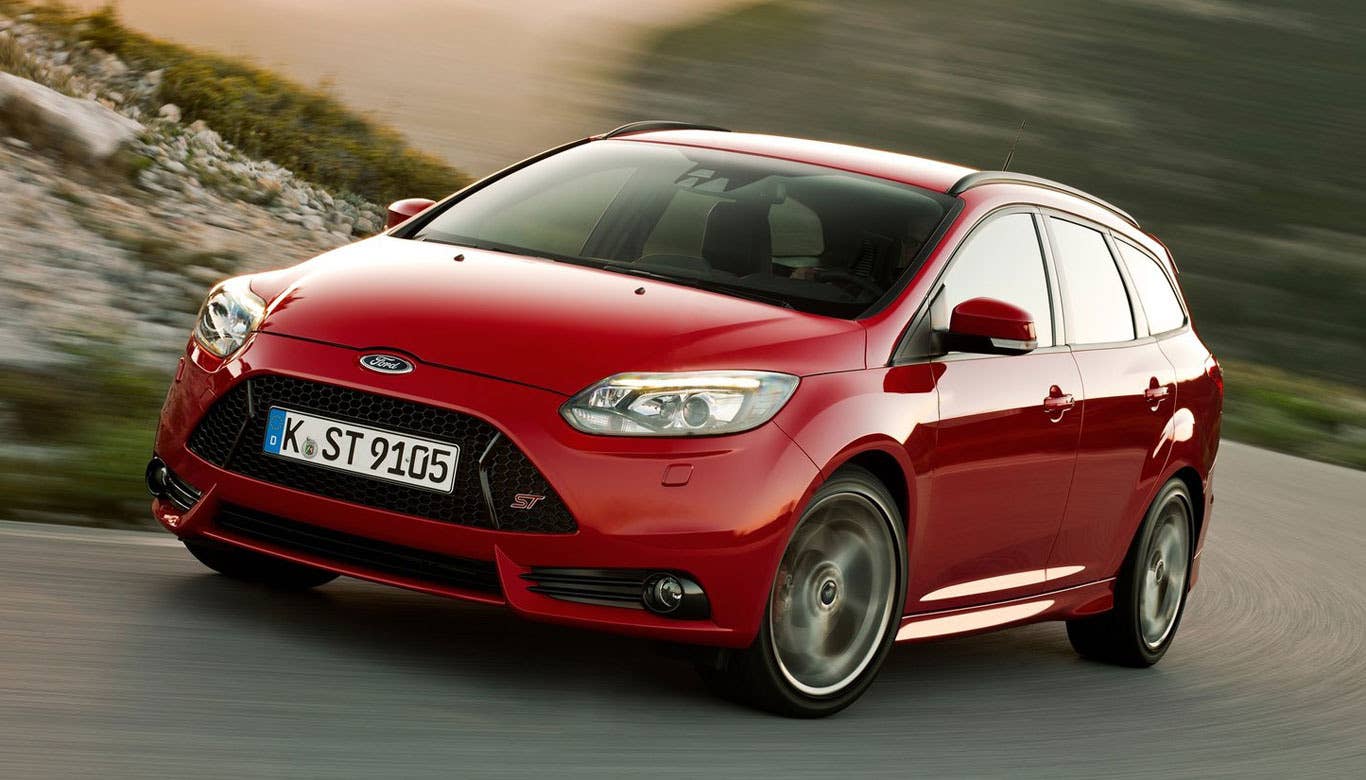 Sticker Price: $24,115 Invoice Price: $22,486 Fuel Economy: 23 mpg city, 32 mpg highway  TheFord Focus ST is fast, fun and functional (not to mention alliterative). Its 2.0L turbocharged engine and sporty handling dynamics make this car an absolute blast to drive and its large cargo area gives it versatility. The unsung feature of the Focus ST, though, is its fuel economy. It's one of the few sports cars you can buy that will exceed 30 mpg.  Research the Ford Focus ST Ford Focus ST Photos & Information Ford Focus ST Best Deals Ford Focus ST Local Dealer Price Quote