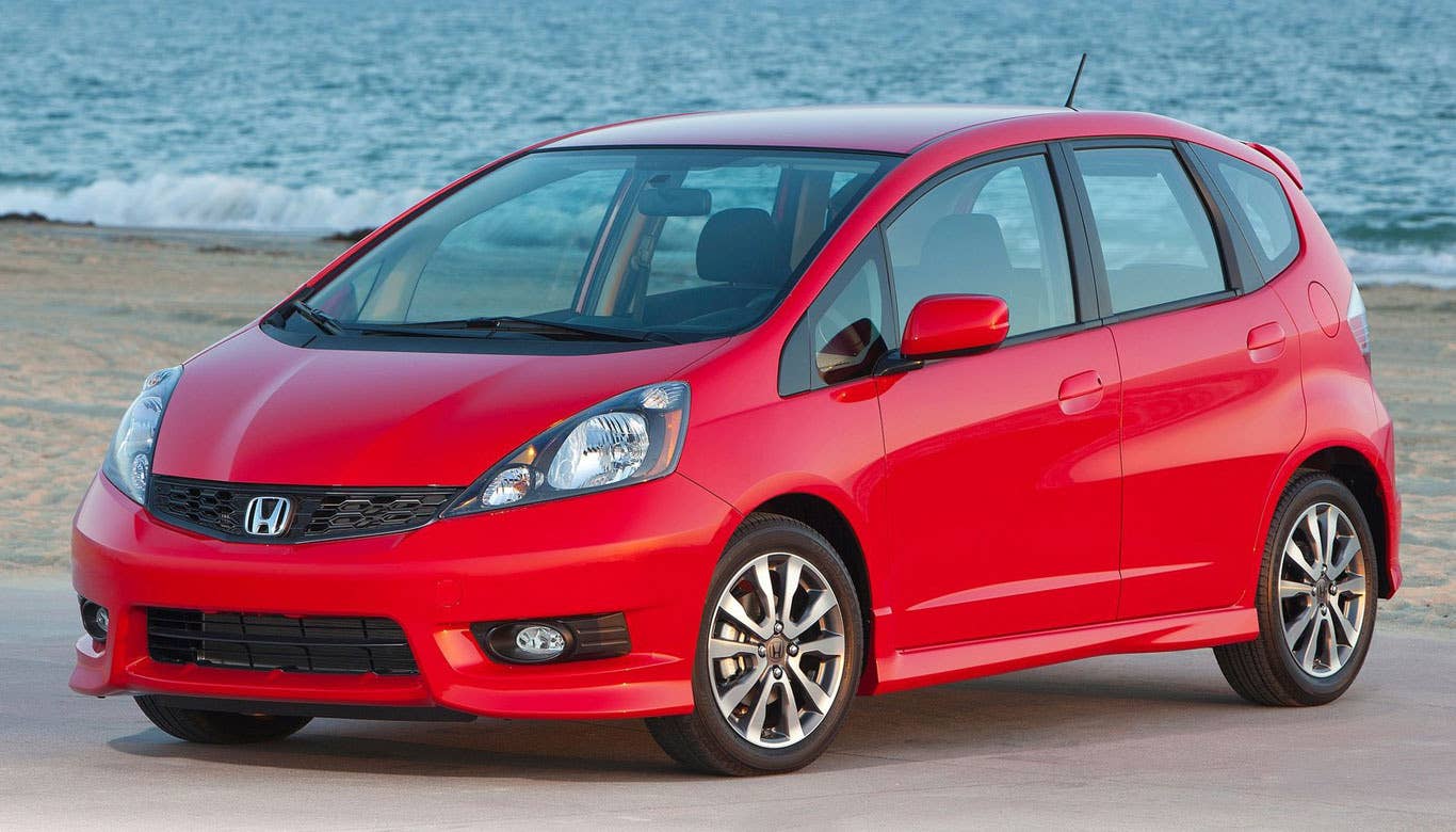 MSRP: $15,425 - $17,160 Invoice: $15,023 - $16,704 Fuel Economy: 27 mpg city, 33 mpg highway  Honda engineers and designers seem to somehow eschew physics and create these big cavernous interiors and cargo areas in smaller vehicles like the CR-V and Fit. The Honda Fit is a favorite vehicle of car shoppers and critics alike. It's reliable, fuel efficient and a family of four can easily be comfortable inside. The fact that it can be had for well under $20,000 is icing on the cake.  Research the Honda Fit Honda Fit Photos & Information Honda Fit Best Deals Honda Fit Local Dealer Price Quote