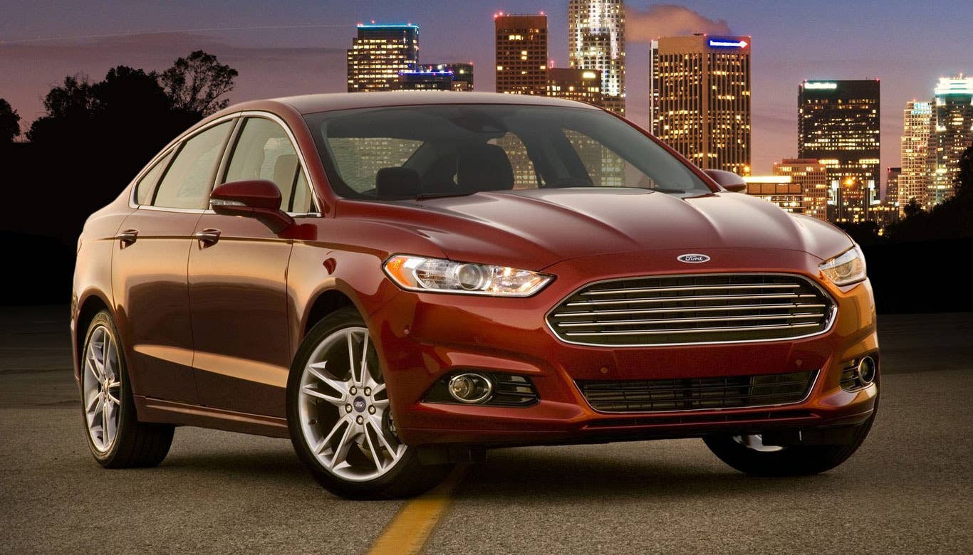 Sticker Price: $21,900 - $32,500 Invoice Price: $20,422 - $29,981 Fuel Economy: 22 mpg city, 34 mpg highway  The handsomeFord Fusion is a versatile family sedan. It is somewhat lacking when it comes to storage capacity, especially when you compare it to some of the hatchbacks and wagons on this list, but it's still quite roomy and comfortable on the inside. Its fuel efficiency and available all-wheel drive system make it great for road trips and inclement weather, as well.  Research the Ford Fusion Ford Fusion Photos & Information Ford Fusion Best Deals Ford Fusion Local Dealer Price Quote