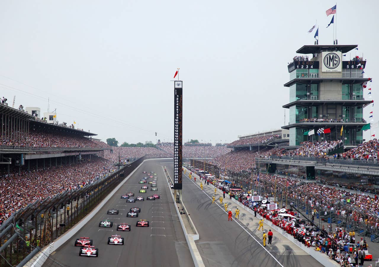 INDIANAPOLIS - MAY 24: Helio Castroneves, driver of the #3 Team Penske Dallara Honda, leads the field at the start of the IRL IndyCar Series 93rd running of the Indianapolis 500 on May 24, 2009 at the Indianapolis Motor Speedway in Indianapolis, Indiana. (Photo by Donald Miralle/Getty Images)