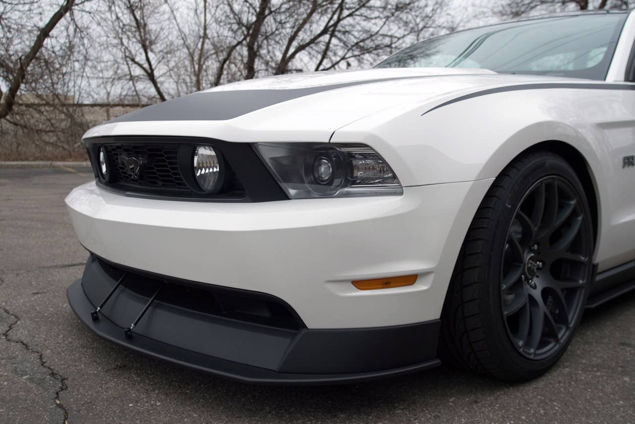 2011 Mustang RTR package: Mustang RTR, a new dealer-installed package for the 2011 Ford Mustang, delivers performance and appearance upgrades for spirited driving. The package was introduced by Vaughn Gittin Jr., driver of the Monster Energy/Falken Tire 2011 Mustang GT in the Formula Drift series. (06/11/2010)