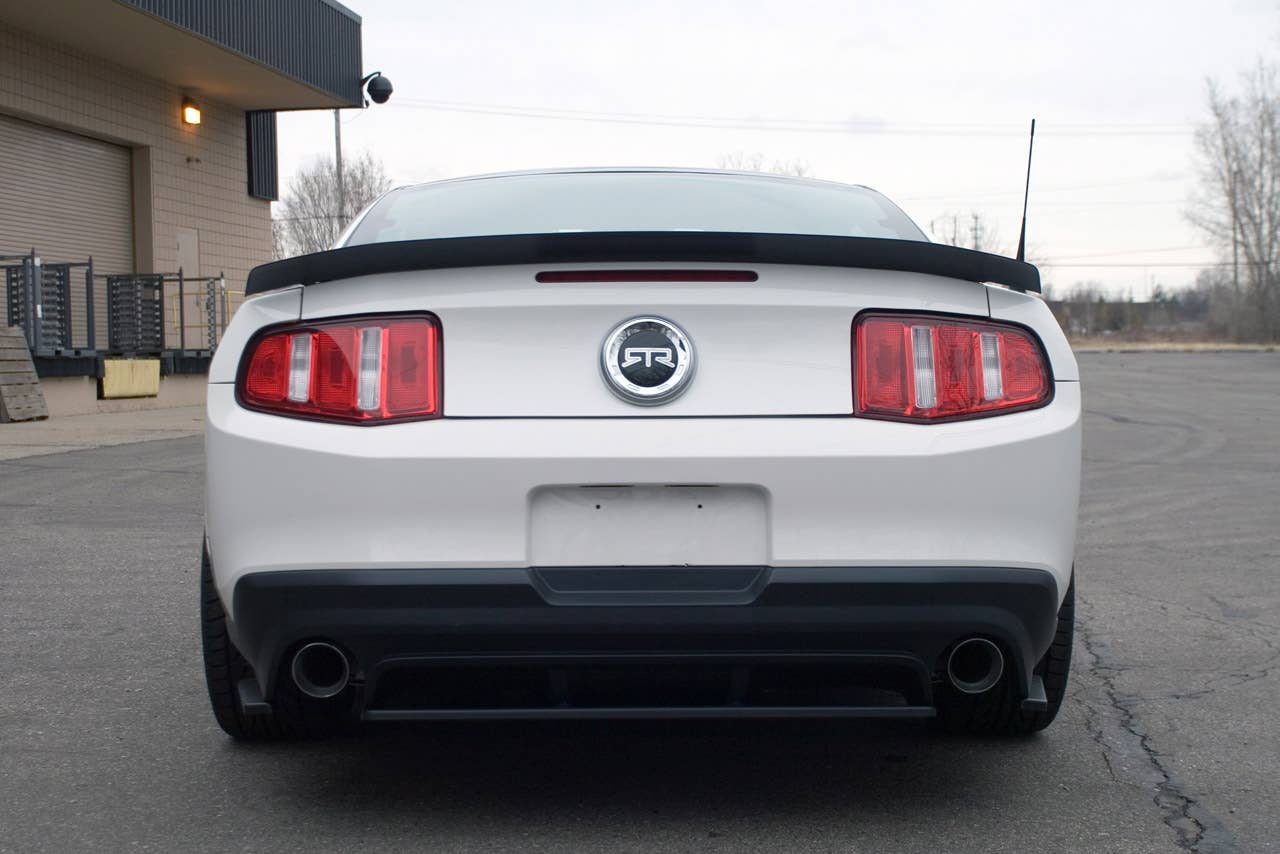 2011 Mustang RTR package: Mustang RTR, a new dealer-installed package for the 2011 Ford Mustang, delivers performance and appearance upgrades for spirited driving. The package was introduced by Vaughn Gittin Jr., driver of the Monster Energy/Falken Tire 2011 Mustang GT in the Formula Drift series. (06/11/2010)