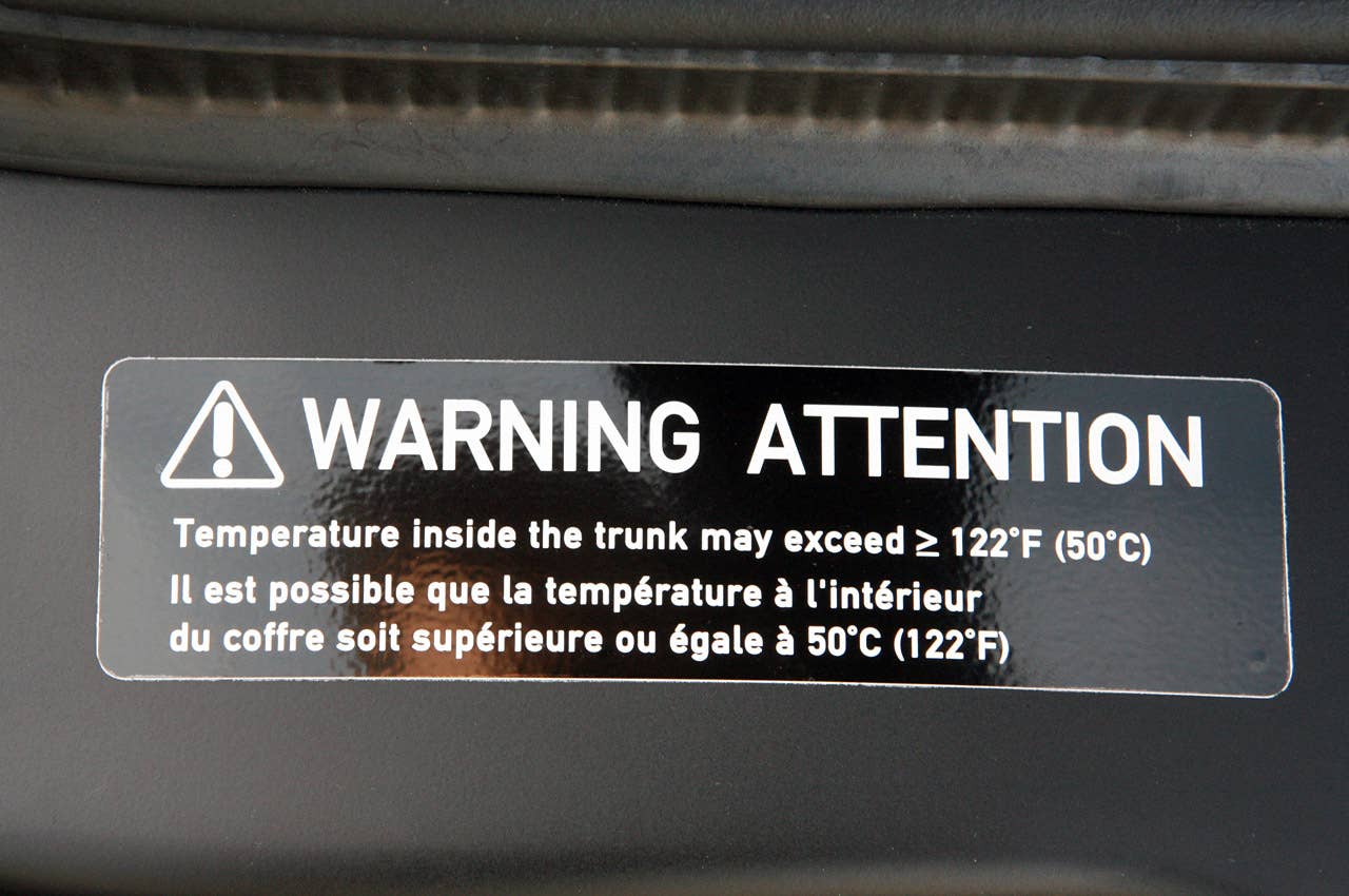 2011 Bugatti Veyron Super Sport trunk warning label