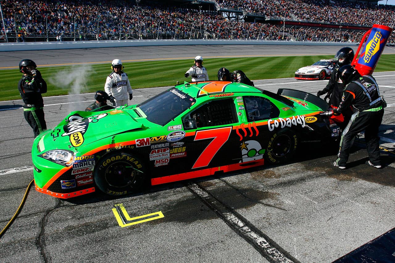 DAYTONA BEACH, FL - FEBRUARY 13:  Crew members work on the #7 GoDaddy.com Chevrolet, driven by Danica Patrick, after a multiple car crash during the NASCAR Nationwide Series Drive4COPD 300 at Daytona International Speedway on February 13, 2010 in Daytona Beach, Florida.  (Photo by Jason Smith/Getty Images for NASCAR) *** Local Caption *** Danica Patrick