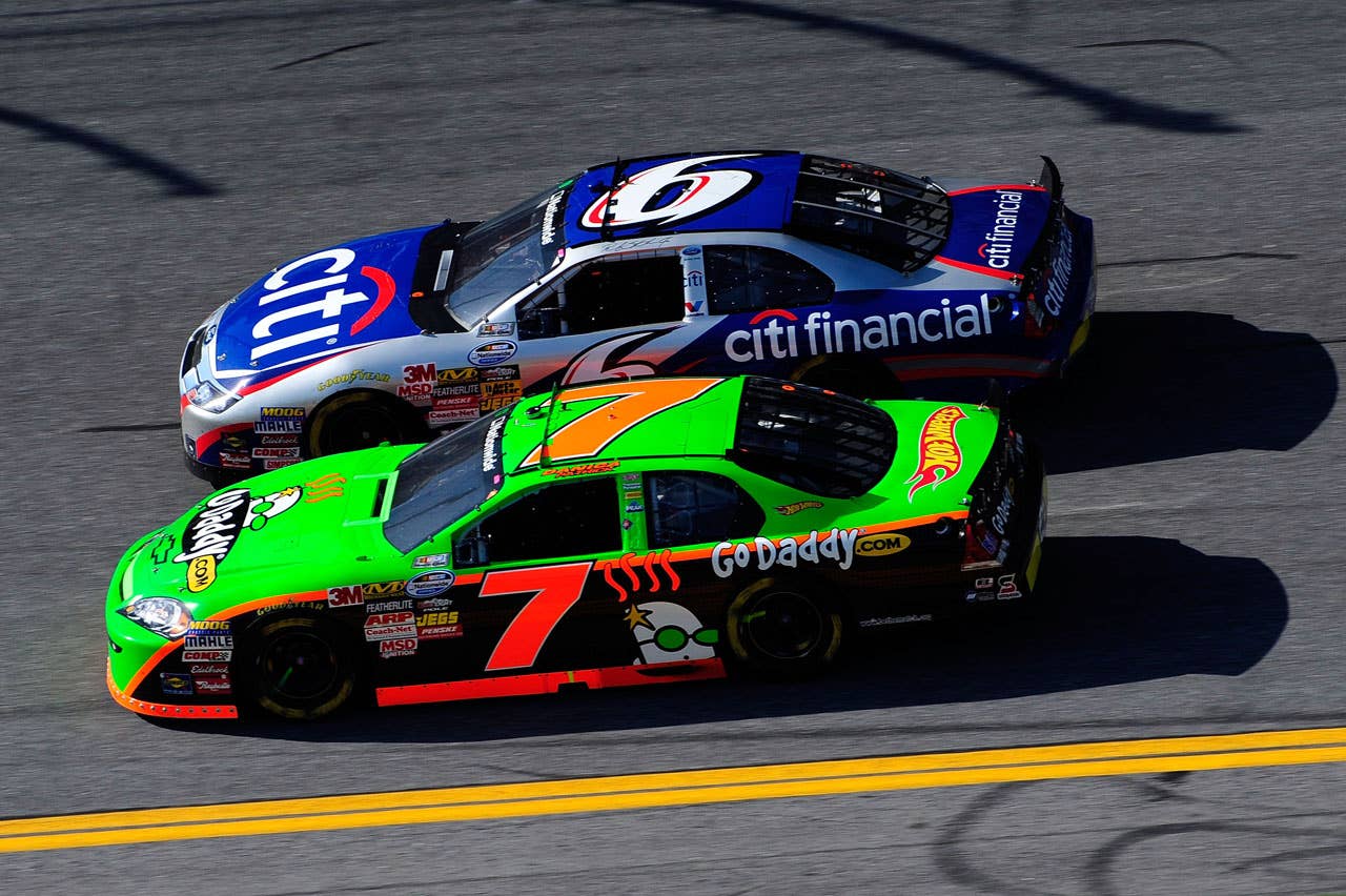 DAYTONA BEACH, FL - FEBRUARY 13:  Danica Patrick, driver of the #7 GoDaddy.com Chevrolet, races Ricky Stenhouse Jr., driver of the #6 CitiFinancial Ford, during the NASCAR Nationwide Series Drive4COPD 300 at Daytona International Speedway on February 13, 2010 in Daytona Beach, Florida.  (Photo by Sam Greenwood/Getty Images) *** Local Caption *** Danica Patrick;Ricky Stenhouse Jr.