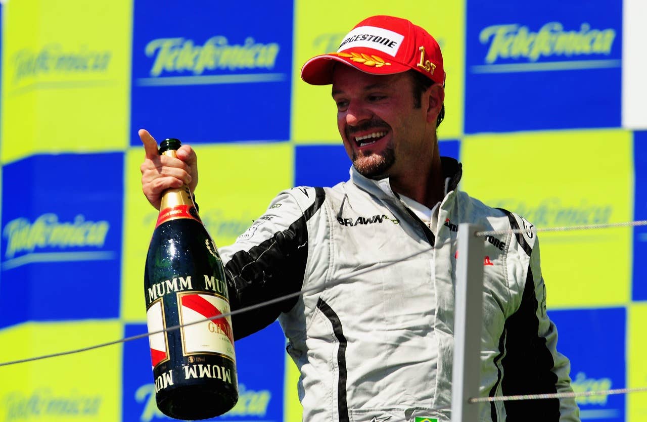 F1 Grand Prix of Europe - Race VALENCIA, SPAIN - AUGUST 23: Rubens Barrichello of Brazil and Brawn GP celebrates on the podium after winning the European Formula One Grand Prix at the Valencia Street Circuit on August 23, 2009, in Valencia, Spain. (Photo by Clive Mason/Getty Images)
