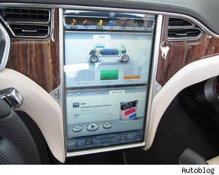 If there's one complaint that seems to apply to nearly every automaker's implementation of technology inside the car, it's that the placement of buttons, controls and other interface elements is seldom designed from a clean sheet of paper. Automakers are in something of a quandary here, because there are plenty of legacy design issues -- so car interiors today are not that much different than they were 50 years ago.  Customers expect the gearshift lever to sprout from between the front seats and speedometers to exist largely behind the steering wheel, so automakers try and cram all their new technology into whatever places in the cockpit they can find. They've almost run out of room, so hopefully we will see some new ideas about technology integration coming soon.