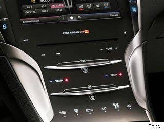 As much as we like touchscreens -- whether in our cars on gracing the front face of our phones -- there are certain implementations that just don't work. Like the button field in the Chevrolet Volt's capacitive touch center stack, which is prone to accidental contact and isn't always clear about whether you've activated a button or not.  But the Volt isn't nearly as bad as the capacitive touch"sliders" found on some Lincoln vehicles. Rather than having a simple volume knob for the stereo or buttons to control the HVAC fan, for instance, the Lincoln has capacitive touch controls that are difficult to operate without looking directly at them.