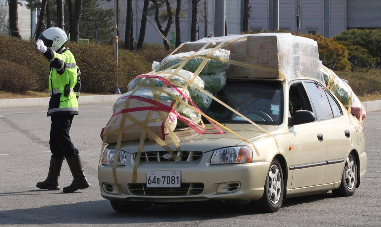 A South Korean vehicle carrying products from North Korea's Kaesong industrial complex arrives at the customs, immigration and quarantine office near the border village of Panmunjom in Paju, South Korea, Saturday, April 27, 2013. South Korea said Friday that it has decided to withdraw the roughly 175 South Koreans still at a jointly run factory complex in North Korea, raising a major question about the survival of the last symbol of inter-Korean cooperation. (AP Photo/Ahn Young-joon)