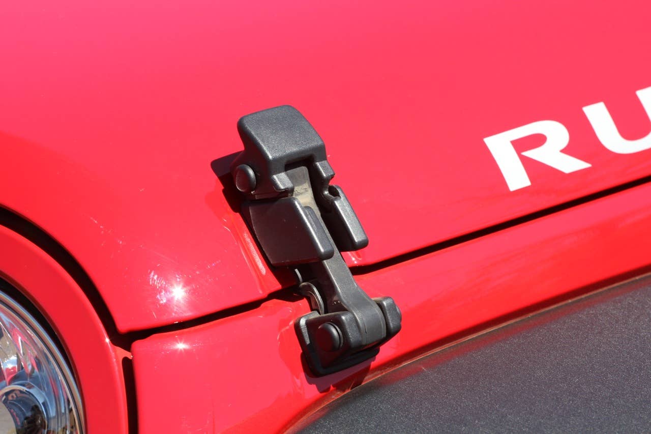 2012 Jeep Wrangler hood clamp