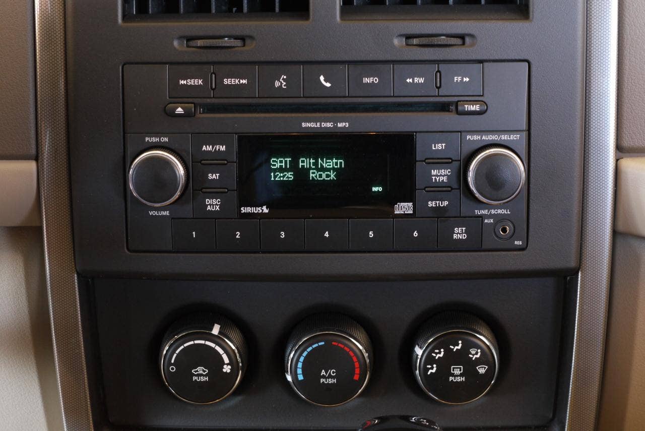 2010 Jeep Liberty Sport audio and climate controls