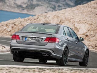 The exterior gets a significant overhaul and more sculpted look. Like many other automakers, Mercedes-Benz is among those following the LED taillight and headlamp craze, adding both on the E63 AMG. Two distinct grilles have been designed to give the car an image that tilts decidedly more toward sports car and less toward stately sedan. Twin-blade radiator grilles have a silver Mercedes-Benz emblem centrally positioned, and the Sport model gets its own distinctive front. Red calipers on the brakes stand out from the commanding exterior.
