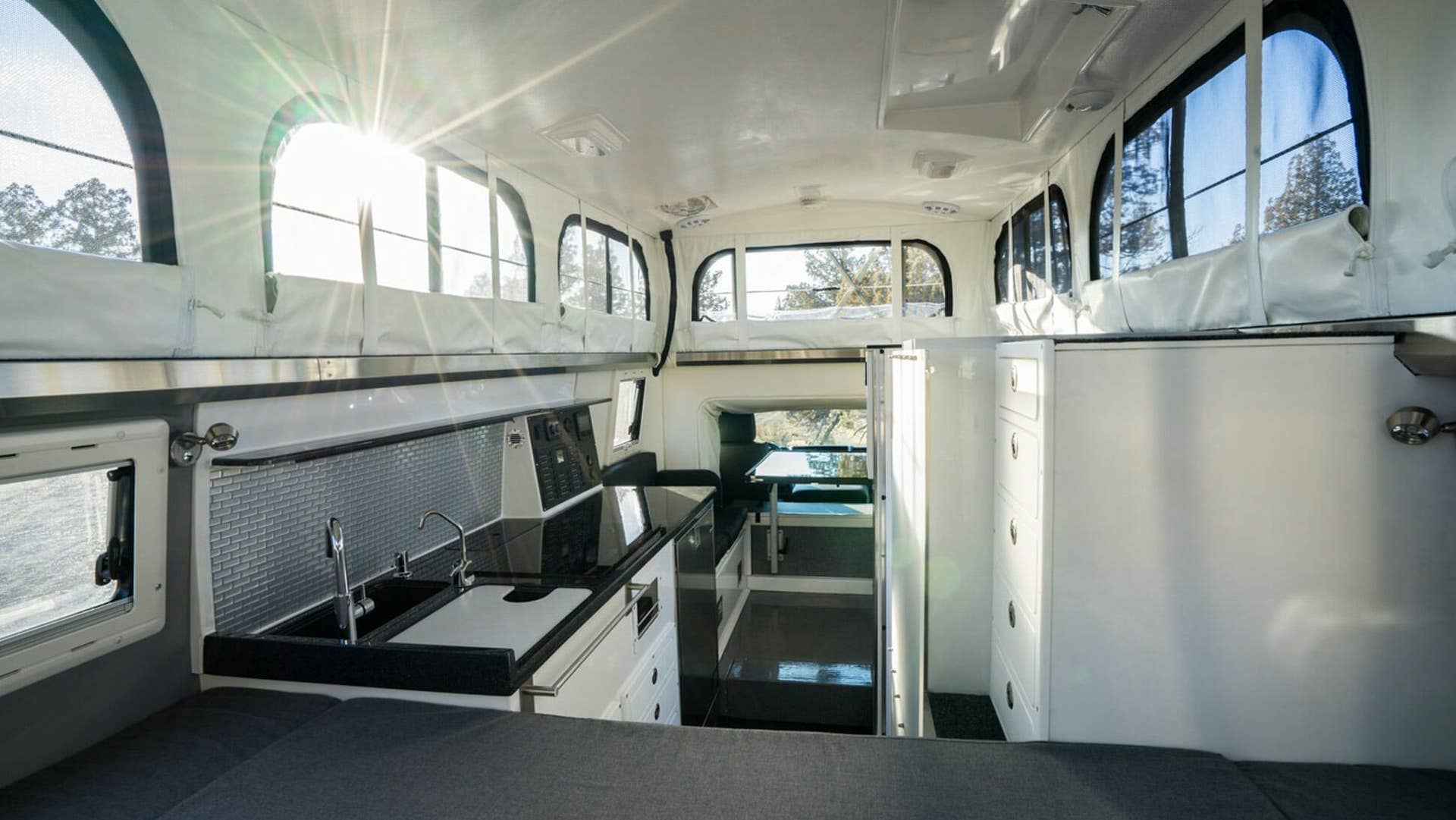 Bend, Oregon's EarthCruiser finally gets to bring a four-seater version of its top two overland rigs to the U.S.