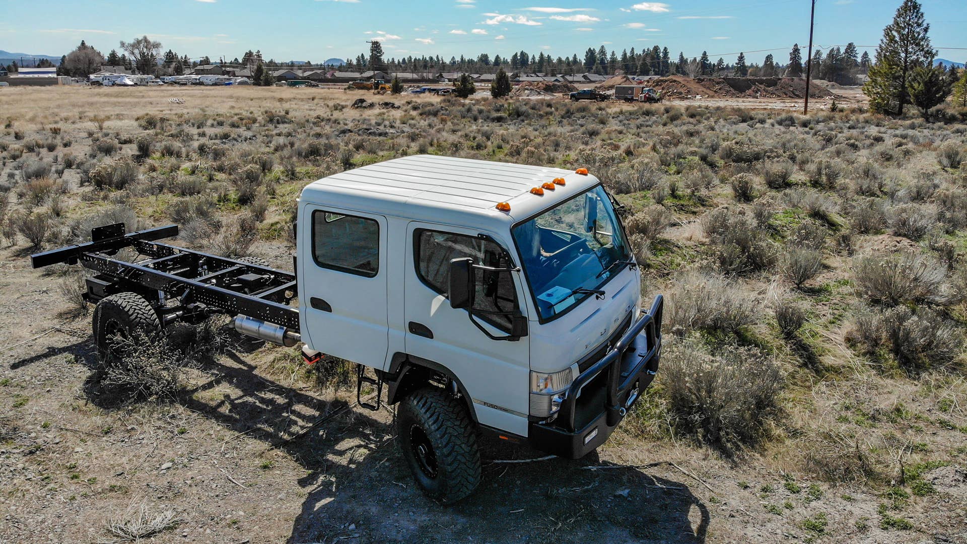 Bend, Oregon's EarthCruiser finally gets to bring a four-seater version of its top two overland rigs to the U.S.