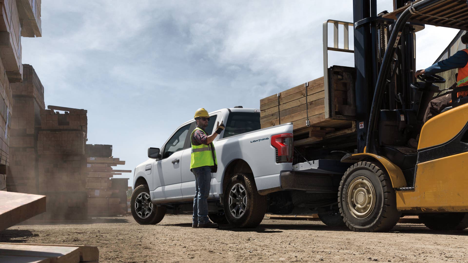 2022 Ford F-150 Lightning Pro. Pre-production model with available features shown. Available starting spring 2022. Cargo and load capacity limited by weight and weight distribution.
