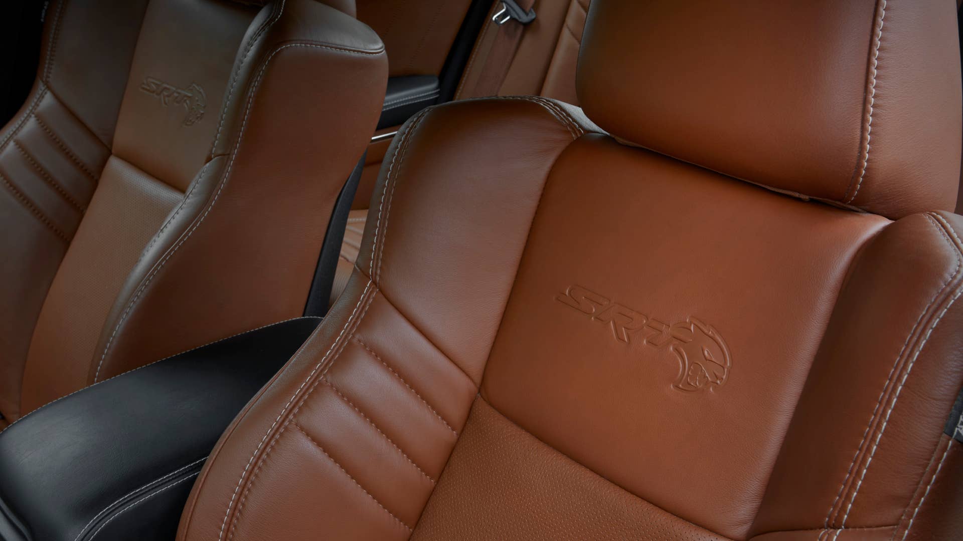 2022 Dodge Charger SRT Hellcat Redeye Widebody Jailbreak model with Sepia Laguna leather seats and Sepia seatbelts. Charger Jailbreak models include five seat options and four seatbelt color options.