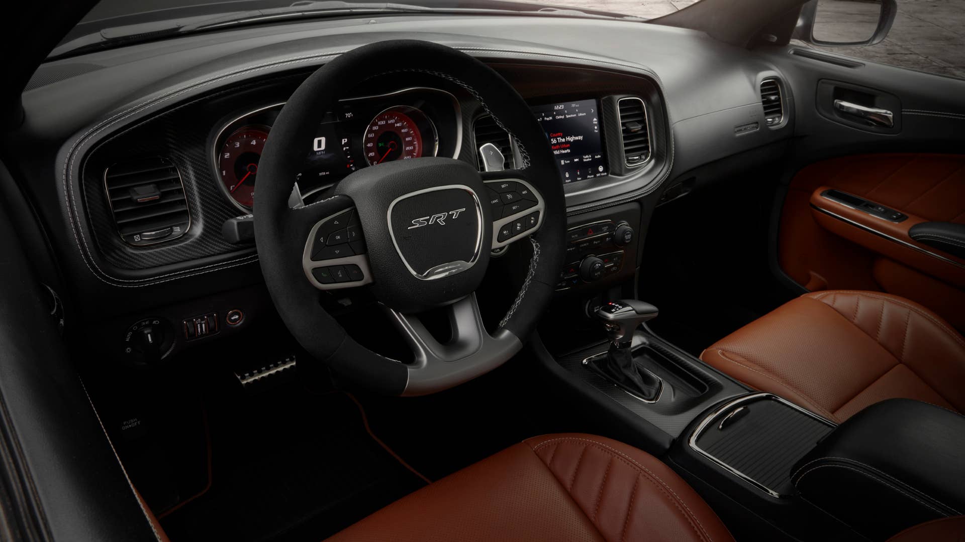 2022 Dodge Charger SRT Hellcat Redeye Widebody Jailbreak model with Sepia Laguna leather seats, Sepia floor mat accents, carbon fiber bezels, suede headliner, Alcantara steering wheel with a white SRT logo and much more that can be customized.