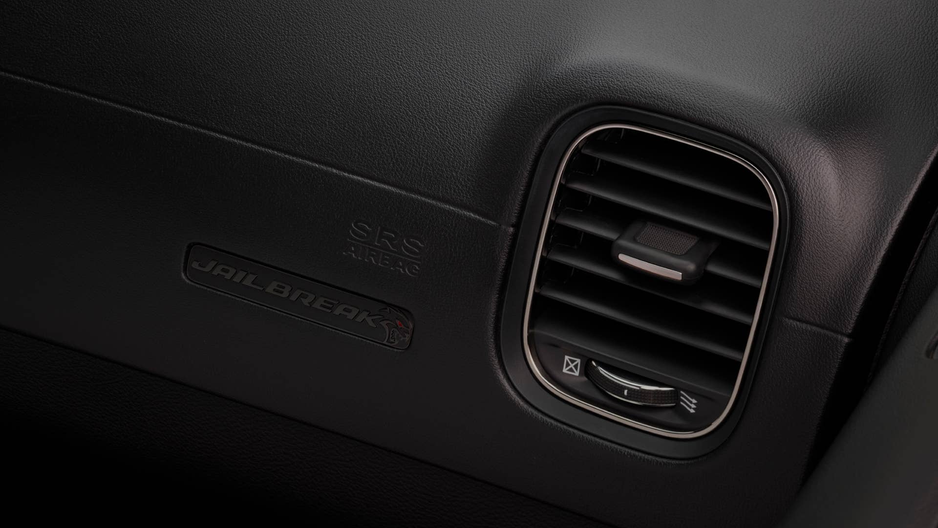 2022 Dodge Charger SRT Hellcat Redeye Widebody Jailbreak models include a unique Jailbreak badge on the instrument panel.