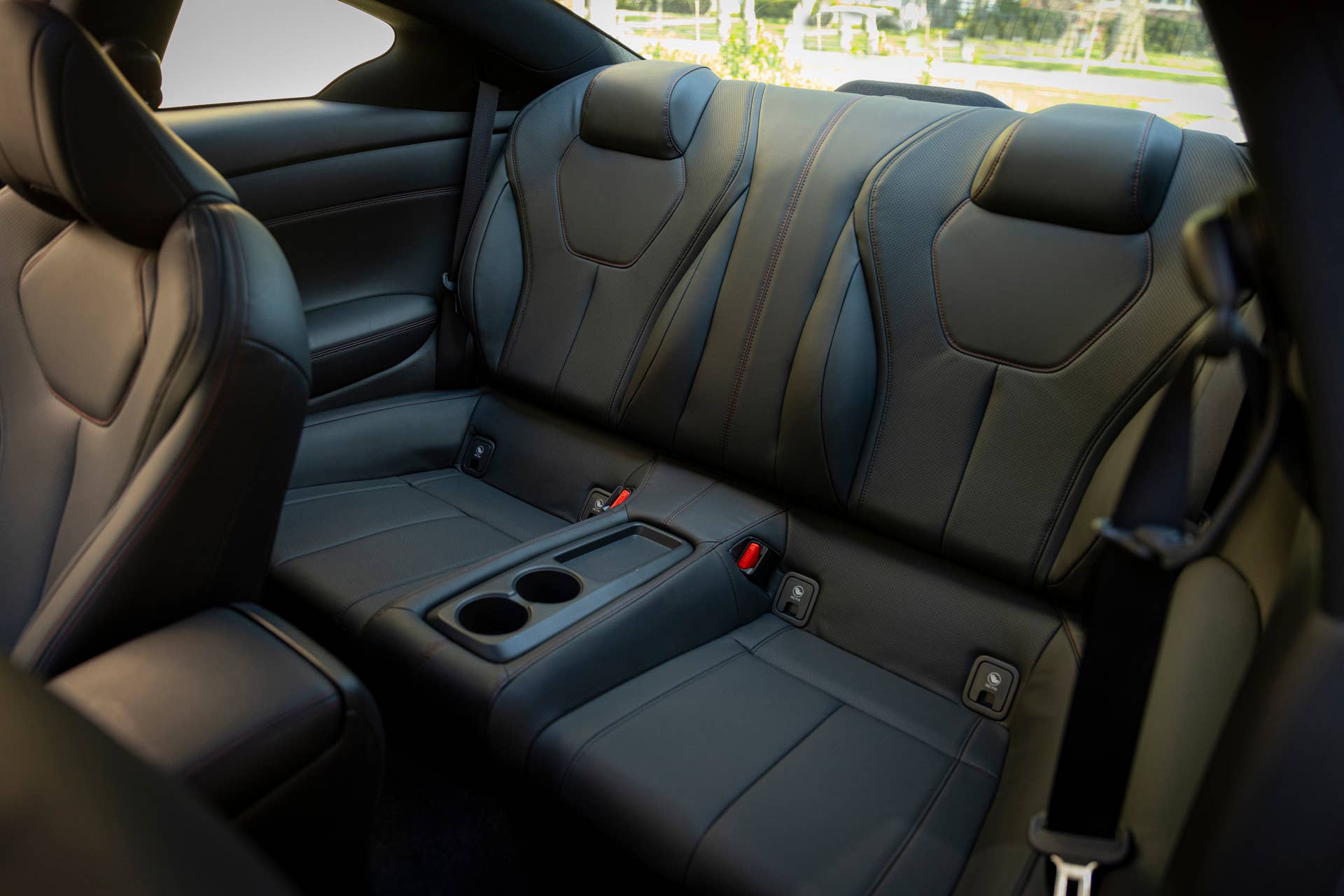 Q60 RED SPORT 400 AWD shown with Graphite trim and contrast red stitching