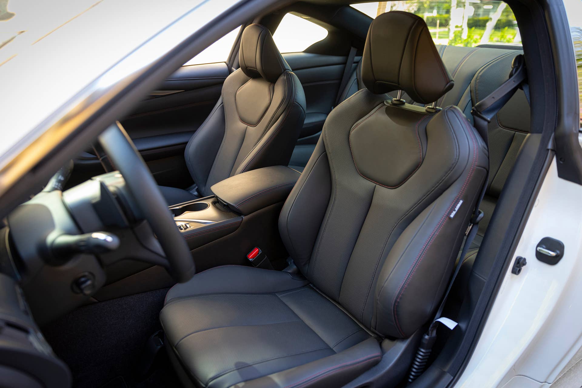 Q60 RED SPORT 400 AWD shown with Graphite trim and contrast red stitching
