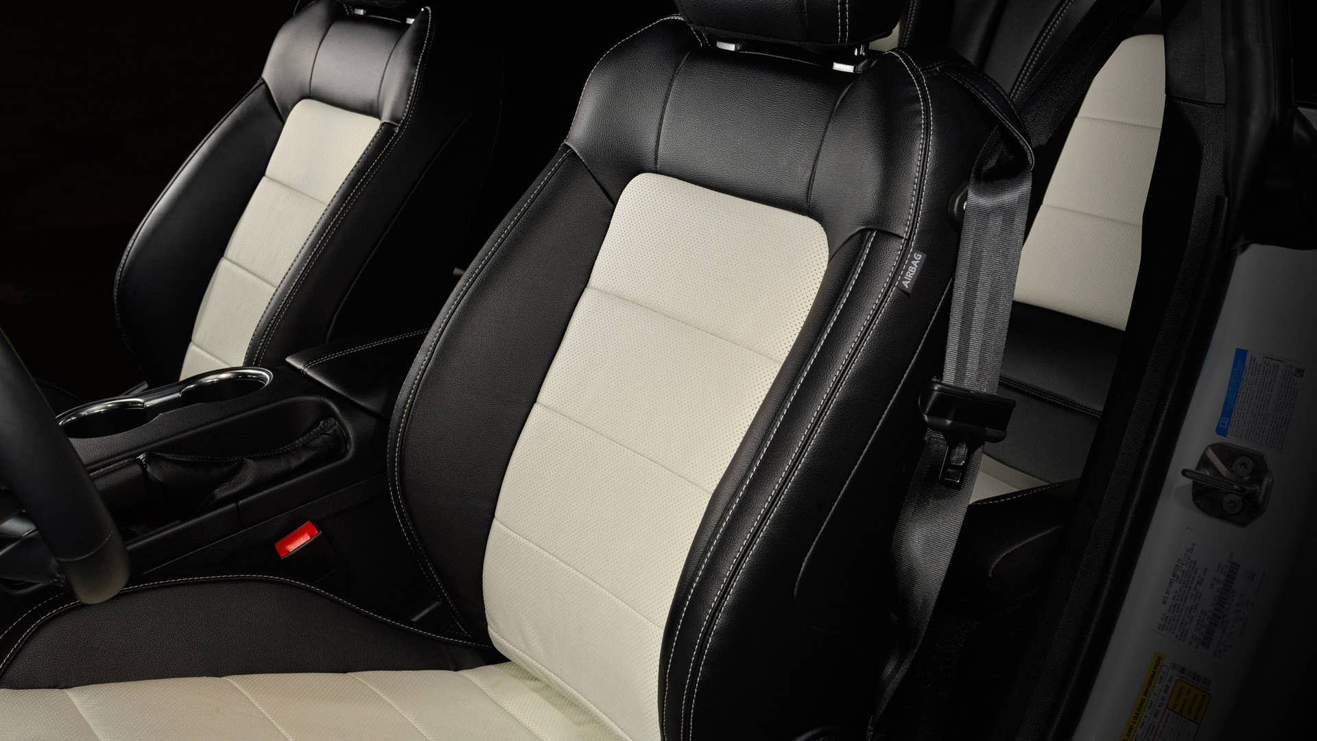 Available Ice White Appearance Package on appropriately configured 2022 Mustang Mach-E and Mustang Coupe models. Closed course.