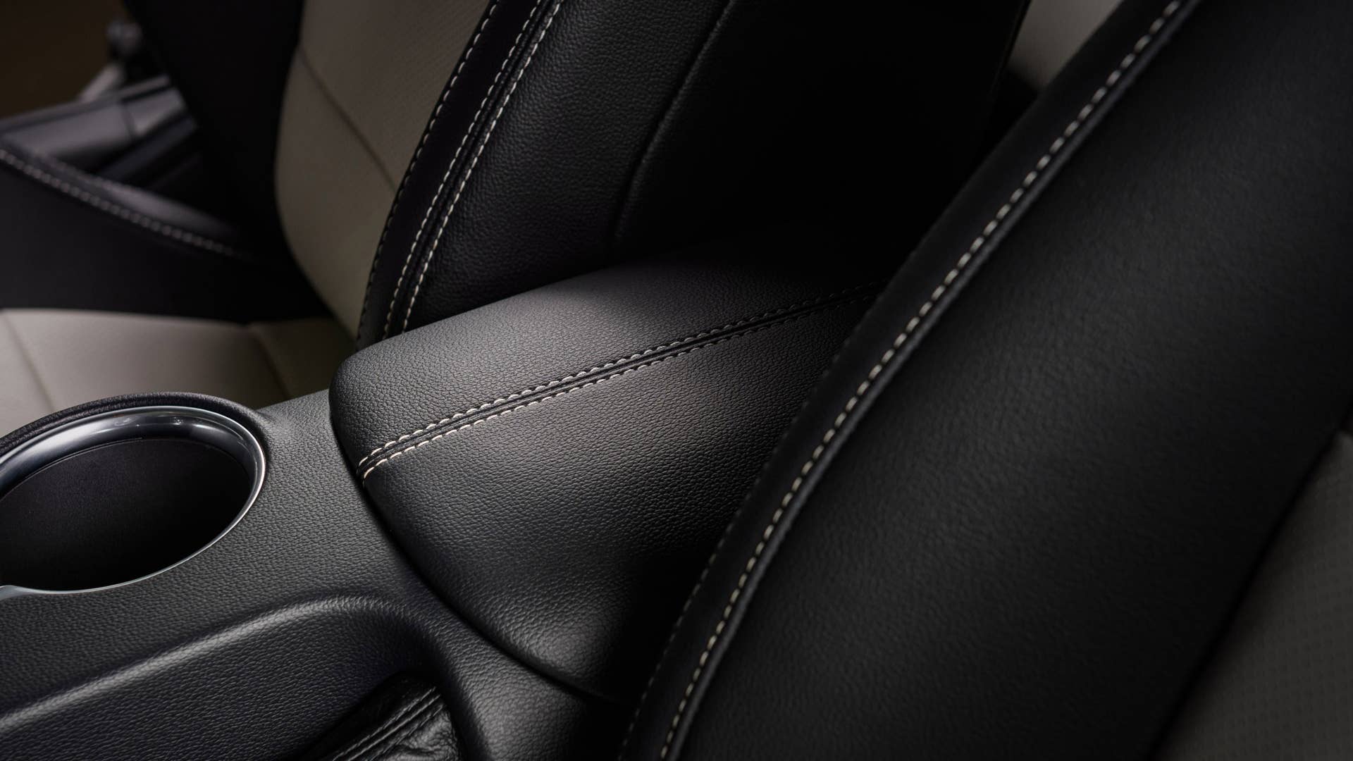 Available Ice White Appearance Package on appropriately configured 2022 Mustang Mach-E and Mustang Coupe models. Closed course.