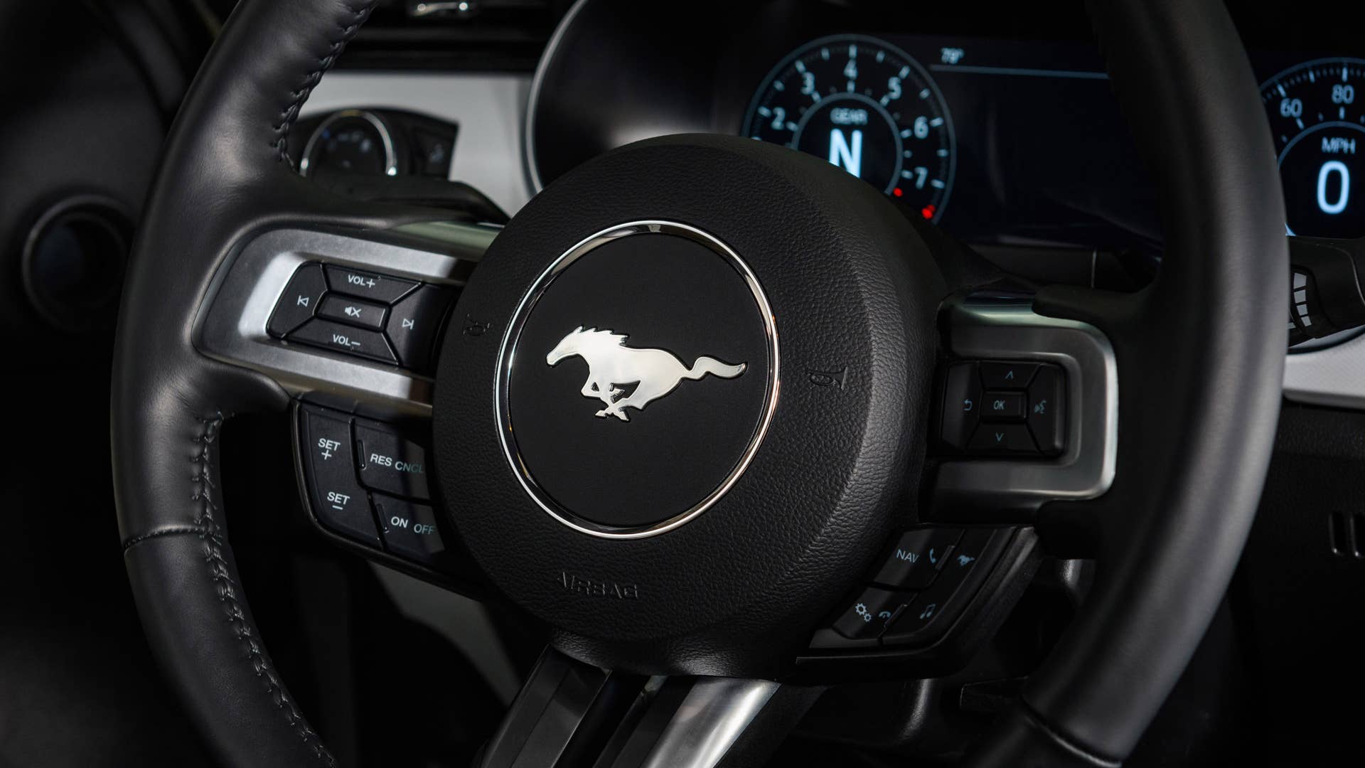 Available Ice White Appearance Package on appropriately configured 2022 Mustang Mach-E and Mustang Coupe models. Closed course.