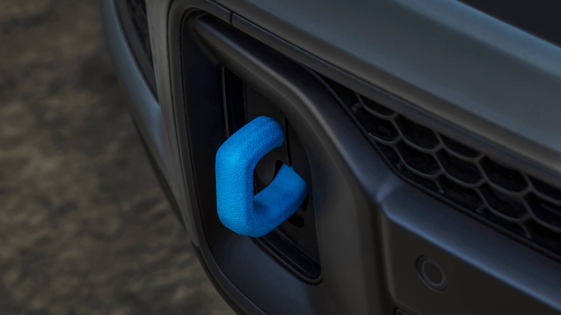 All-new 2022 Jeep® Grand Cherokee Trailhawk 4xe features blue tow hooks.