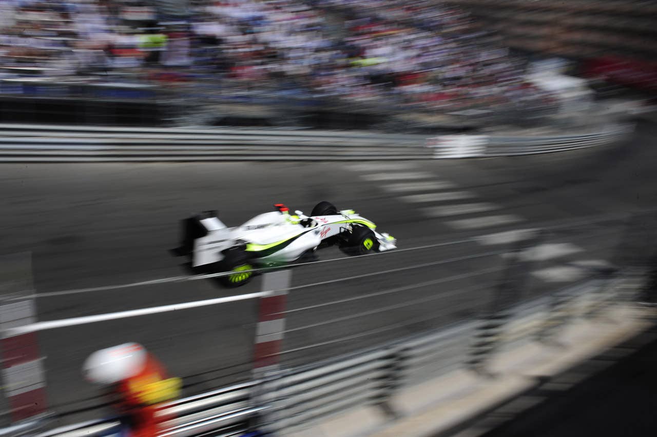 Brawn GP's British driver Jenson Button drives at the Monaco racetrack on May 24, 2009 in Monte Carlo, during the Monaco Formula One Grand Prix. Brawn GP's British driver Jenson Button won the race ahead his Brazilian team mate Rubens Barrichello and Ferrari's Finnish driver Kimi Raikkonen. (picture taken with a tilt and shift lens) AFP PHOTO / POOL / FRED DUFOUR (Photo credit should read FRED DUFOUR/AFP/Getty Images)